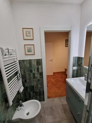 a bathroom with a sink and a toilet at Casa Luminosa in Monteverde in Rome