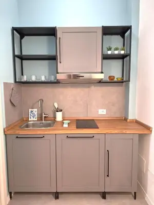 a kitchen with a sink and a counter top at Casa Laila in Rome