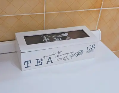 a tea box sitting on top of a toilet at Costantino Imperatore Apt in Rome
