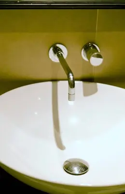 a bathroom sink with a water faucet at Hotel Valeri in Rome