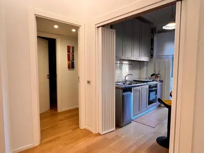 a kitchen with a sink and a stove top oven at San Giovanni tourist accommodation in Rome