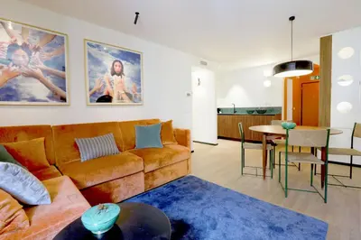 a living room with a couch and a table at ​Easylife - Elegante trilocale in Piazza Navona in Rome