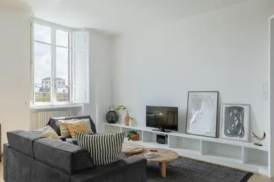 a living room with a couch and a tv at iFlat Contemporary Elegant Skyline in Rome in Rome