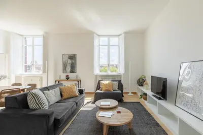 a living room with a couch and a table at iFlat Contemporary Elegant Skyline in Rome in Rome