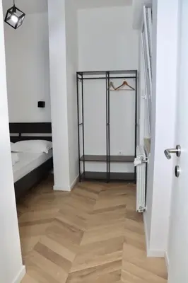 a bedroom with a bed with two towels on it at Alessi Home Pigneto in Rome