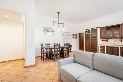 a living room with a couch and a table at Vatican Art Apartment in Rome