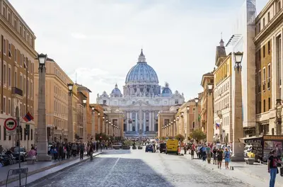a city street with a building in the background at Double Pixel Apartments - Wonderful Stay in Rome