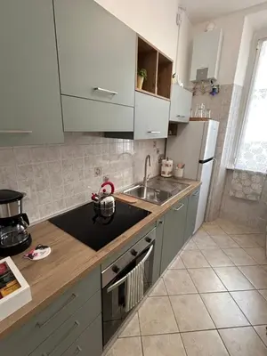 a kitchen with a sink and a counter top at Domus Vittoria in Rome