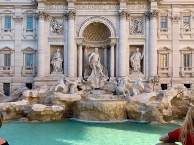 a building with a fountain in front of a building at Luxury Suite Monti Quirinale in Rome