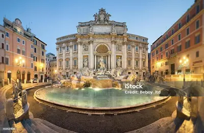 a large building with a fountain in front of it at Trevi Fountain big apartment in Rome