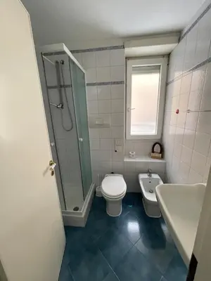 a bathroom with a toilet and a shower and a sink at Vatican Vibes - 5 minutes from the Pope in Rome