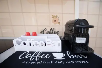 a coffee maker sitting on top of a counter at CaSa e Caffarella in Rome