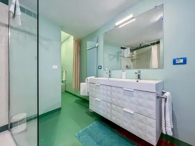 a bathroom with a sink and a mirror at Inn Pantheon Home in Rome