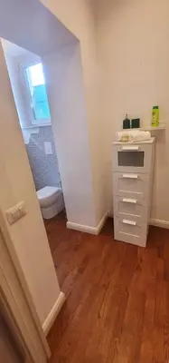 a bathroom with a sink and a toilet at Suite Benedict Pantheon in Rome