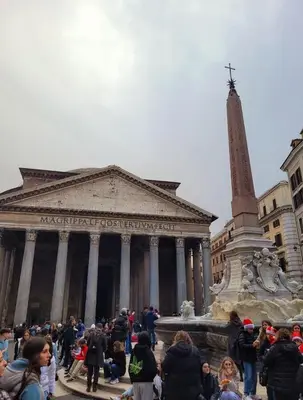a crowd of people standing in front of a building at Suite Benedict Pantheon in Rome