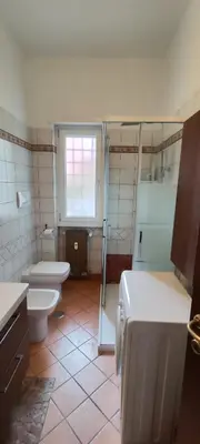 a bathroom with a shower and a toilet and a sink at Casa con Lorenzo in Rome