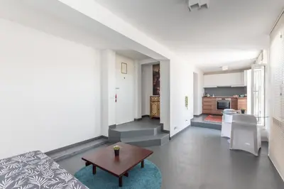 a living room with a couch and a table at Balduina Home in Rome