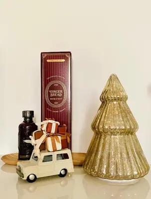 a toy car and a christmas tree next to a book at Talamo Heritage in Rome