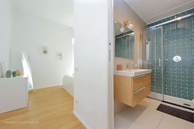a bathroom with a sink and a shower at Casa Magnifica in Rome