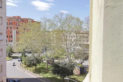 a view of a city street from a building at Casa Magnifica in Rome