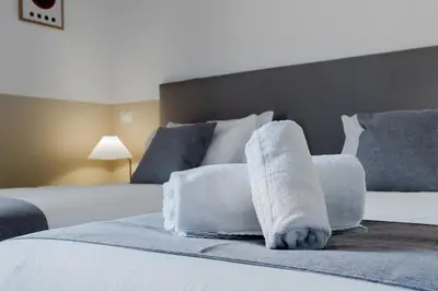 a hotel room with two towels on a bed at Flowers Apartment - grande casa a Montesacro in Rome