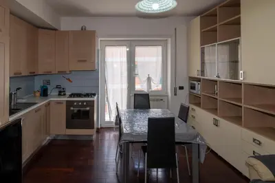 a small bathroom with a sink and a window at Apartment Marconi 2833 in Rome
