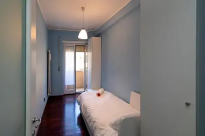 a living room with a couch and a table at Apartment Marconi 2833 in Rome
