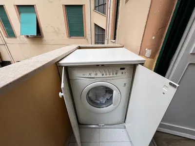 a washer and dryer sitting in a building at My Roman Home - Prati Vaticano in Rome