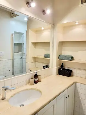 a bathroom with a sink and a mirror at Monteoppio one in Rome