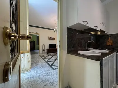 a kitchen with two sinks and a counter top at Big bright Flat - Vatican Foro Italico in Rome