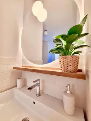 a bathroom with a sink and a mirror at Casa Sommeiller in Rome