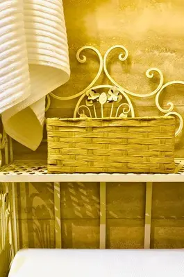 a basket sitting on a table with a pillow at The Best Nest in Rome