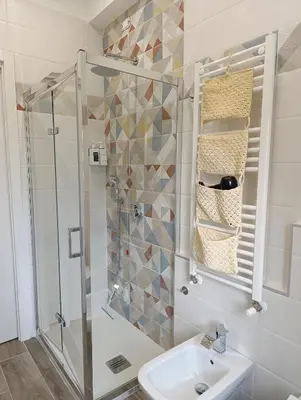 a bathroom with a shower and a sink at Casa Vacanze LaMatta Music House in Rome
