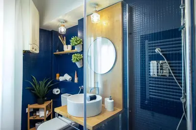 a bathroom with a sink and a shower at Piazza Navona Elegant Apartment in Rome
