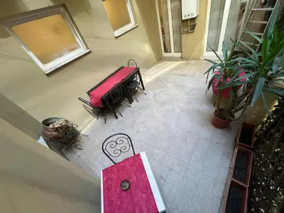 an overhead view of a table and chairs in a room at La Dimora di Sara a 10 minuti da Termini in Rome
