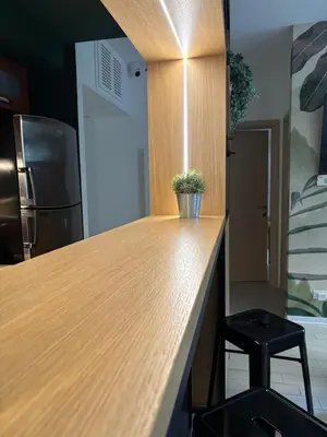 a kitchen with a counter with a potted plant on it at da Nonna Dina in Rome