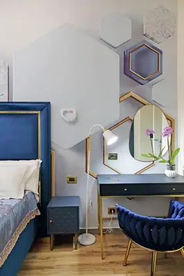 a bedroom with a bed and a desk and a mirror at Just Chilling Ferruccio in Rome