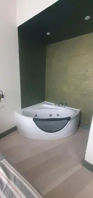 a white bath tub sitting in a bathroom at Home Domus Castel Sant'Angelo in Rome
