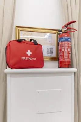 a red bag sitting on top of a white shelf at cinquepuntozero in Rome