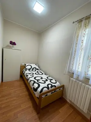a bedroom with a bed in a room with a window at Eternal Lemon Home in Rome