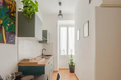 a kitchen with a sink and a counter top at La Casa Di Rinny - Vaticano in Rome