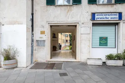 an entrance to a building with a sign on it at GuestHost - Pannonia Colosseum in Rome
