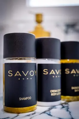 a group of three bottles of soap on a counter at Restart Accommodations Colonna e Ludovisi in Rome