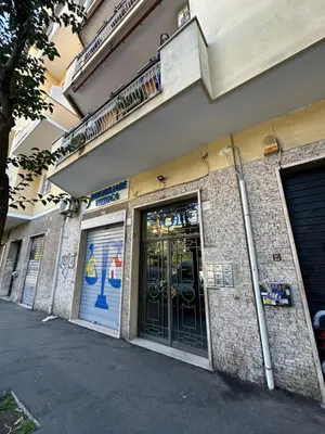 a facade of a building with doors and windows at Marta Suite - Metro Malatesta & Wi-Fi in Rome
