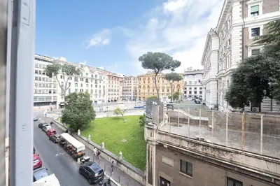 a view of a city street with buildings and cars at Splendor Eternal 3 BR Apartment in the City Center in Rome