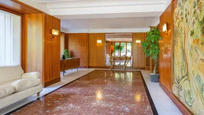 a living room with a couch and a table at Vatican Park Residence in Rome