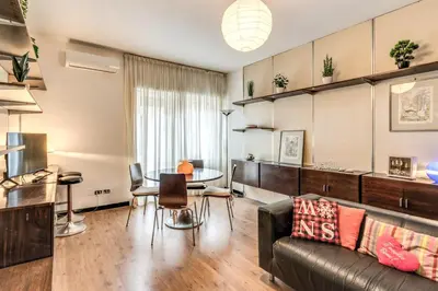 a living room with a couch and a table at Zeus House in Rome