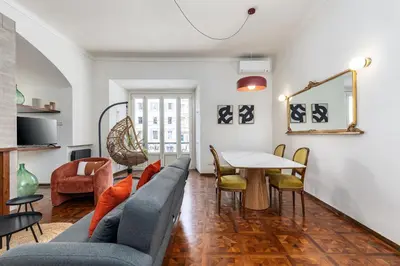 a living room with a couch and a table at Rome As You Feel - Argentina Luxury Apartment in Rome