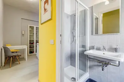 a bathroom with a sink and a glass shower at BDC - Kingdom 5-BDR in Termini in Rome