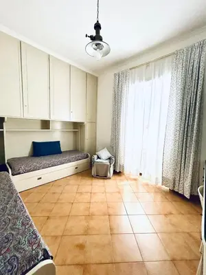 a bedroom with a bed and a large window at Casa San Pietro Rome Vatican in Rome